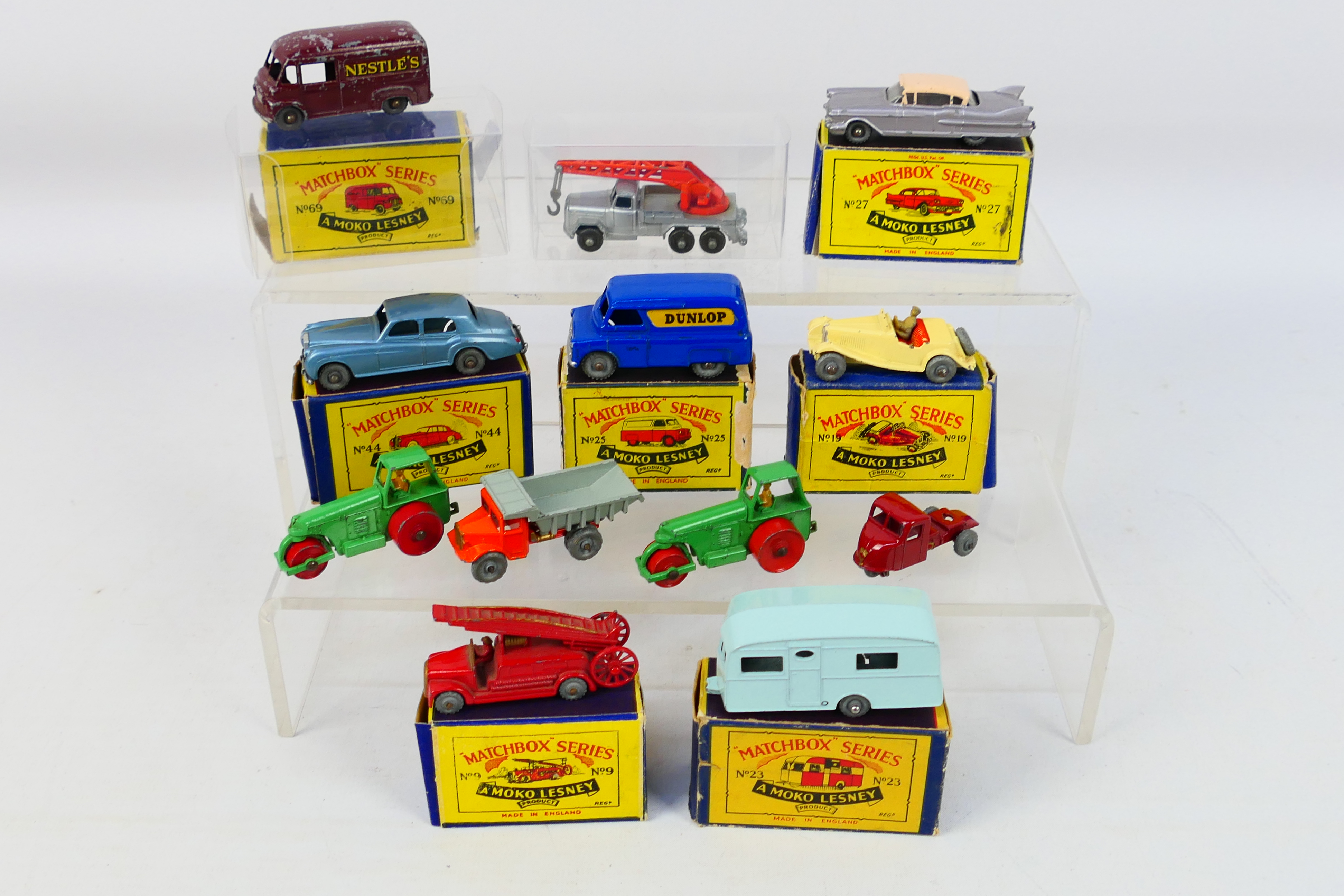 Matchbox - A collection of vehicles including MG Sports # 19, Cadillac Sixty Two # 27,