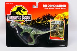 Kenner - Jurassic Park - A 1993 Blister packed figure of Dilophosaurus from Jurassic Park.