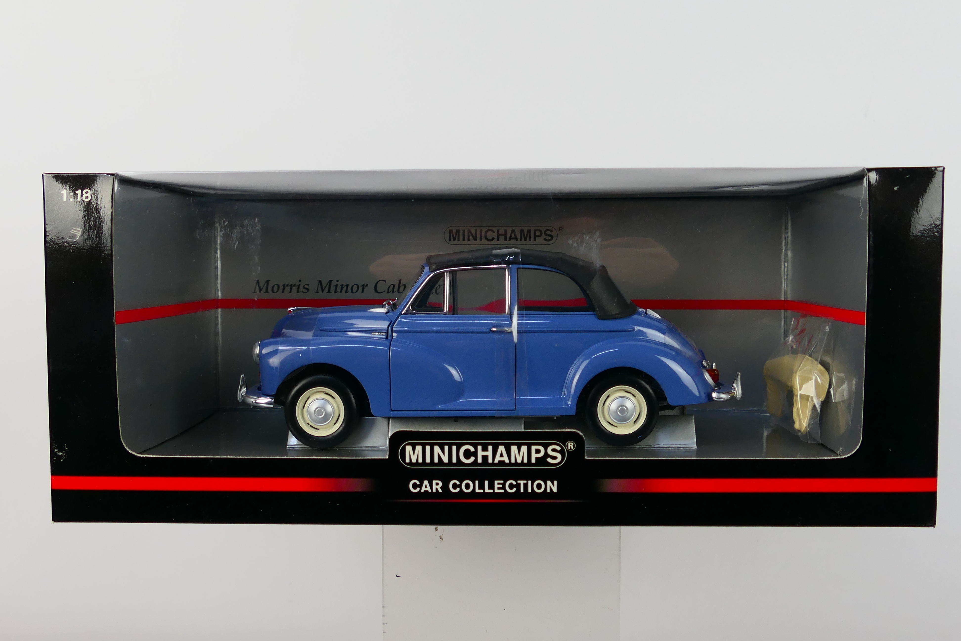 Minichamps - A boxed Minichamps #150137030 1:18 scale Morris minor Cabriolet.