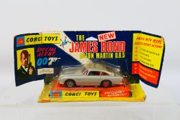 Corgi - James Bond - An unopened 007 Aston Martin DB5 in the early pictorial wing flap packaging #