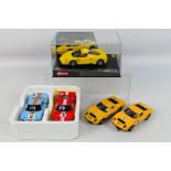 Scalextric - Carrear Four unboxed Scalextric slot cars with a boxed Carrera #25703 Ferrari Enzo