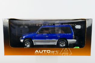 AutoArt - A boxed AutoArt #77101 1:18 scale 1998 Mitsubishi Pajero LWB.