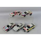 Scalextric - Five unboxed Scalextric slot cars.