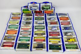 Oxford Diecast - A collection of 40 Oxford Diecast Metal vehicles including busses with adverts: