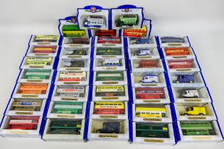 Oxford Diecast - A collection of 40 Oxford Diecast Metal vehicles including busses with adverts: