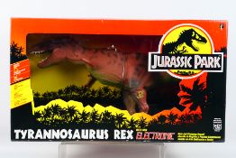 Kenner - Jurassic Park - A 1993 Jurassic Park Tyrannosaurus Rex with Electronic Roar and stomping