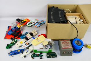 Scalextric - An unboxed group of Scalextric slot cars,