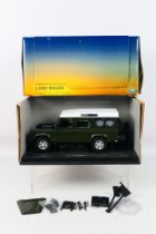 Universal Hobbies - A boxed Universal Hobbies #UH3887 1:18 scale Land Rover Defender 110 Station