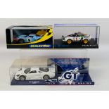 Scalextric - Fly - Team Slot - Three boxed 1:32 scale slot cars.