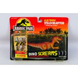 Kenner - Jurassic Park - A 1993 Blister packed figure of Electronic Velociraptor with Slashing