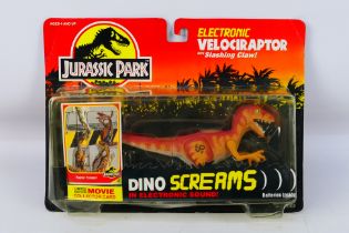 Kenner - Jurassic Park - A 1993 Blister packed figure of Electronic Velociraptor with Slashing