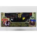 Ertl - A boxed 1:18 scale Ertl 'American Muscle' #36685 'Munsters Koach'.