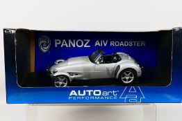 AutoArt - A boxed AutoArt #78212 1:18 scale '1998 Panoz AV Roadster.