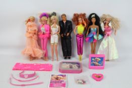 Mattel - Barbie - 6 x Barbie dolls and a Ken doll with some accessories.