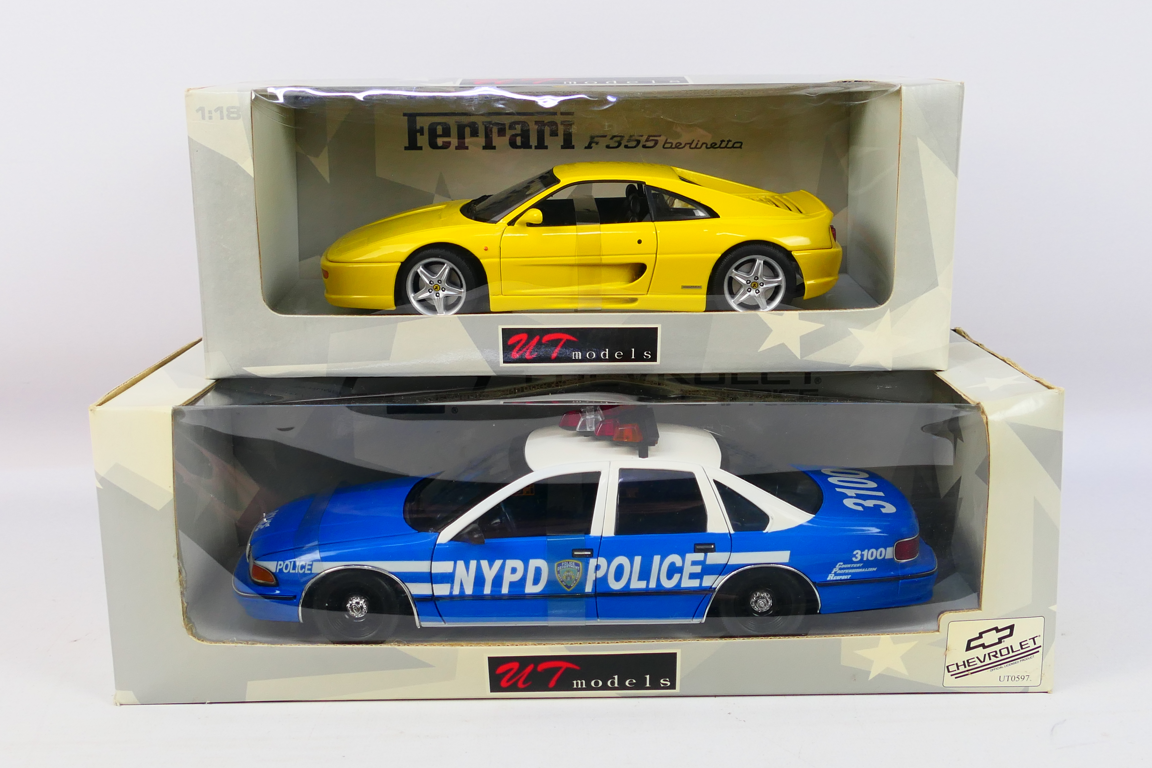 UT Models - Two boxed UT Models 1:18 scale diecast model cars,