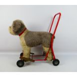 Tri-ang - A vintage 'International Model Aircraft Ltd' Push-A-Long Dog by Tri-ang.