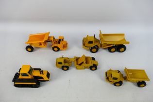 Ertl - Joal - A group of unboxed construction vehicles, CAT D25D articulated dumper,