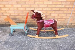 A vintage Push-A-Long Dog with plush rocking horse.