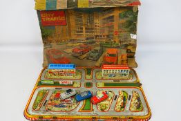 City Traffic - Tin Plate - Vintage - A City Traffic Drive and Park play set (#313).