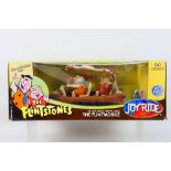 JoyRide - A rare boxed The Flintstones Flintmobile in 1:18 scale in die cast metal # 33735.