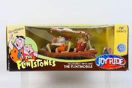 JoyRide - A rare boxed The Flintstones Flintmobile in 1:18 scale in die cast metal # 33735.