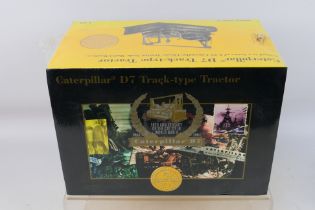 Norscot NZG - A factory sealed limited edition 1:25 scale Caterpillar D7 Track-type tractor # 386.