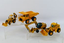 NZG - A group of unboxed 1:50 scale construction vehicles, a CAT 769C dump truck # 222,