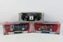 Road Signature - Signature Models - Three boxed diecast 1:18 scale model cars.