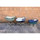 Three vintage children's toy prams. Prams show age and play wear appearing Poor - Fair in general.