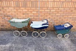 Three vintage children's toy prams. Prams show age and play wear appearing Poor - Fair in general.