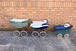 Three vintage children's toy prams. Prams show age and play wear appearing Poor - Fair in general.