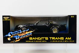 Ertl - A boxed 1:18 scale Ertl 'American Muscle' #33131 'Smokey and The Bandit' Bandit's Trans Am.