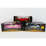 Maisto - Three boxed diecast 1:18 scale model cars.