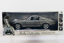 Shelby Collectibles - A boxed Shelby Collectibles 1:18 scale 1967 Shelby GT 500E 'Eleanor'.