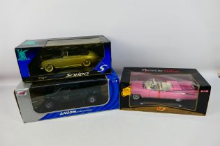 Solido - Anson - Maisto - Three boxed diecast 1:18 scale model cars.