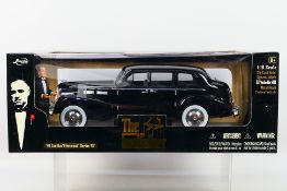 Jada Toys - A boxed 1:18 scale Jada Toys #91670 '40 Cadillac Fleetwood Series 75 from 'The