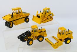 Conrad - 4 x unboxed CAT construction vehicles, a CS653 compactor # 2889,