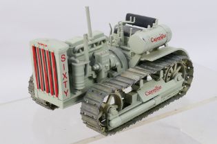 Conrad - A limited edition 1:25 scale 1931 Caterpillar Model Sixty Diesel crawler tractor released