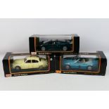 Maisto - Three boxed 1:18 scale diecast model cars from Maisto.