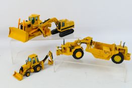 NZG - A group of unboxed 1:50 scale CAT construction vehicles, a 428 back hoe loader # 285,