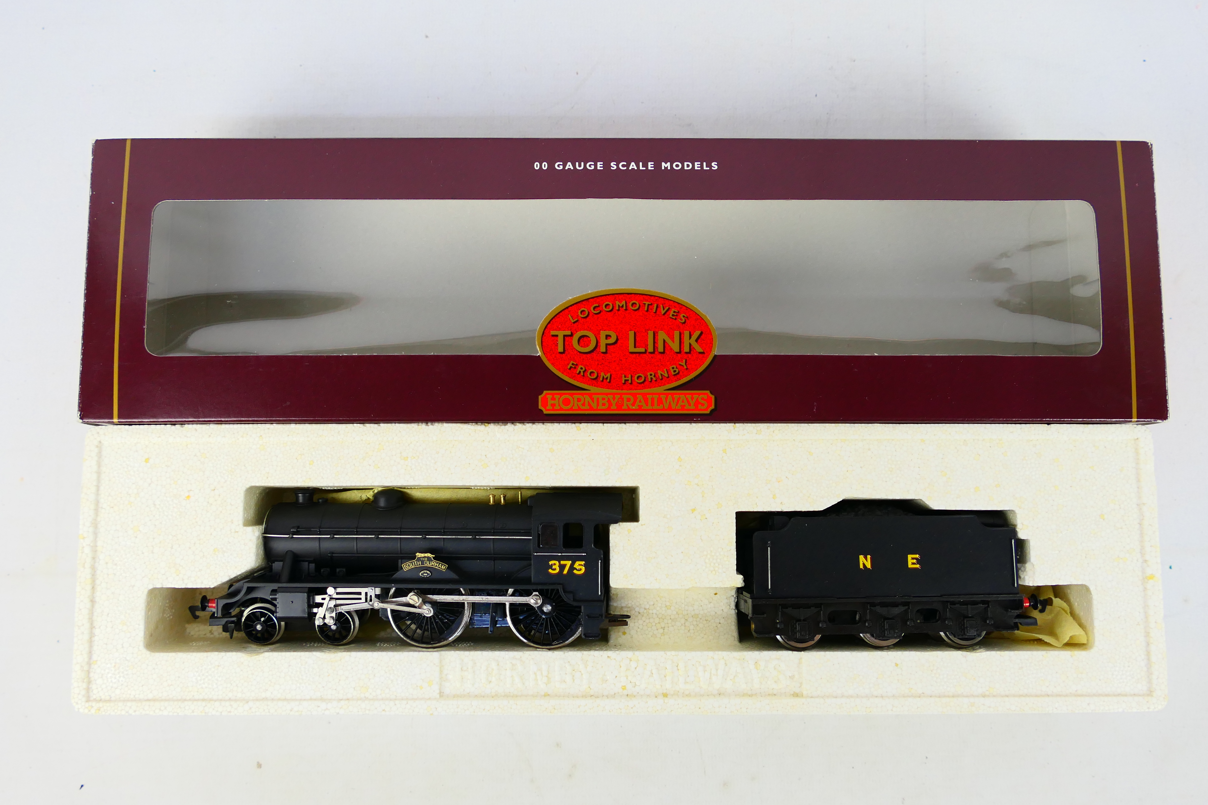 Hornby - A boxed Hornby 'Top Link' OO gauge R2021 $-4-0 steam locomotive and tender Op.No.