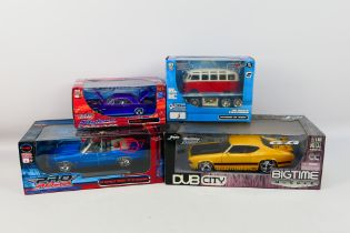 Jada - Maisto - Four boxed diecast 'Muscle' themed model cars in larger scales.