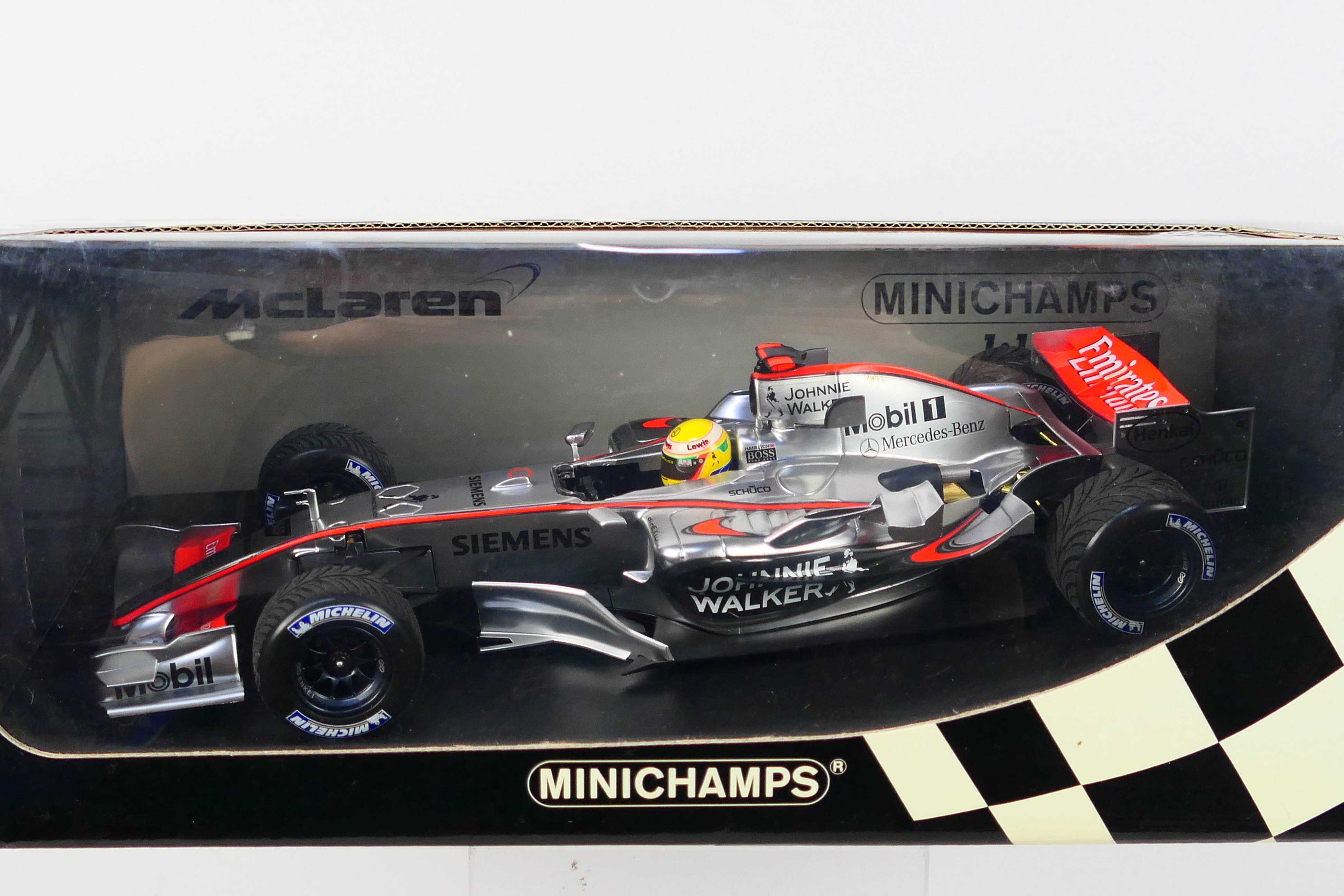 Minichamps - A boxed limited edition 1:18 scale McLaren Mercedes MP4-21 Lewis Hamilton 1st roll out - Image 2 of 3