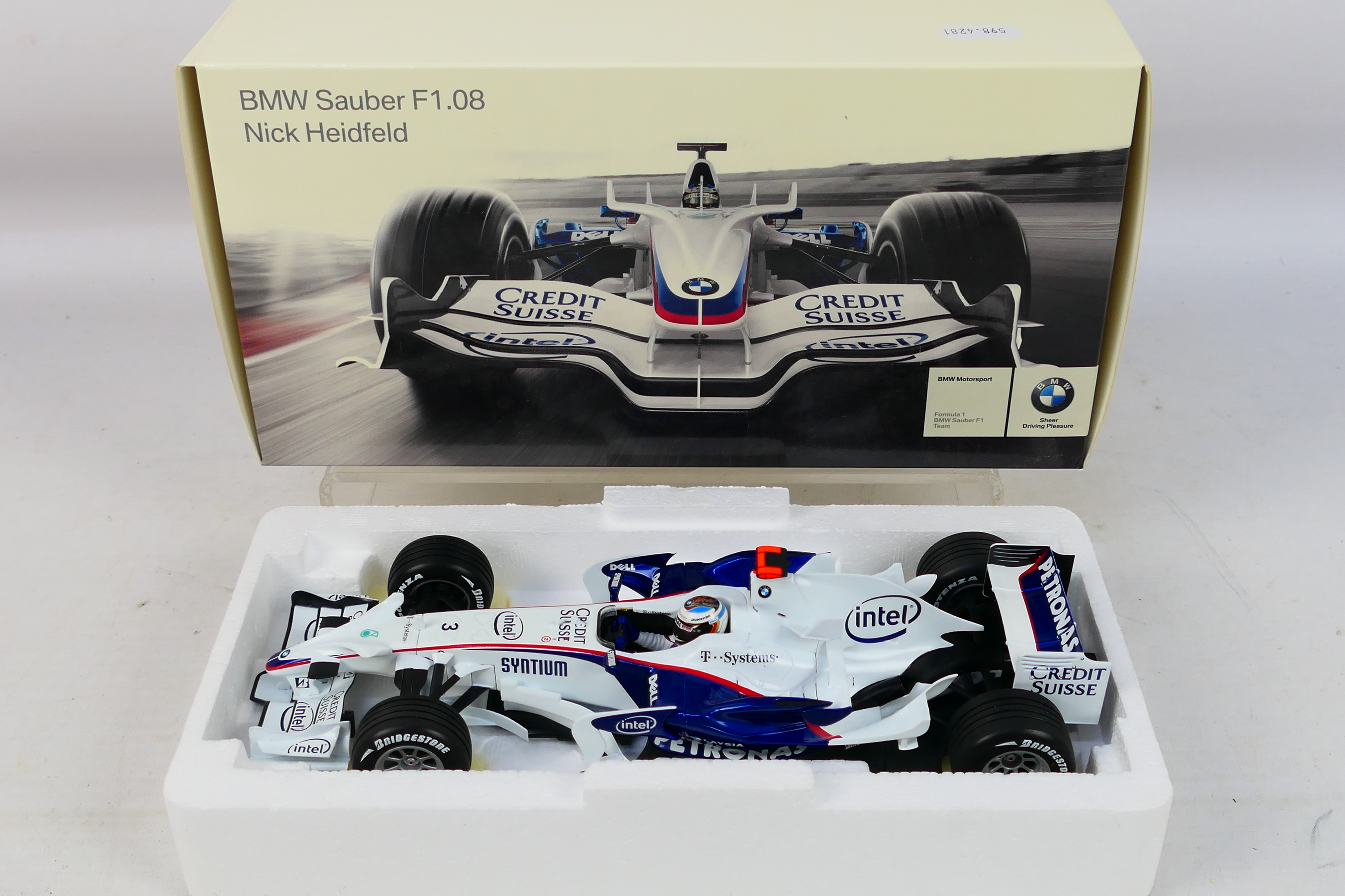 Minichamps - A boxed BMW dealer edition 1:18 scale BMW Sauber F1.08 Nick Heidfeld car # 80430444650.