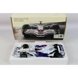 Minichamps - A boxed BMW dealer edition 1:18 scale BMW Sauber F1.08 Nick Heidfeld car # 80430444650.