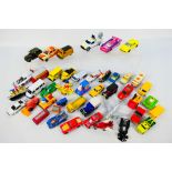 Dinky - Corgi - Ertl. A selection of Forty loose, Playworn diecast models.