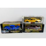 Ertl - UT Models - Three boxed diecast 1:18 American model cars.