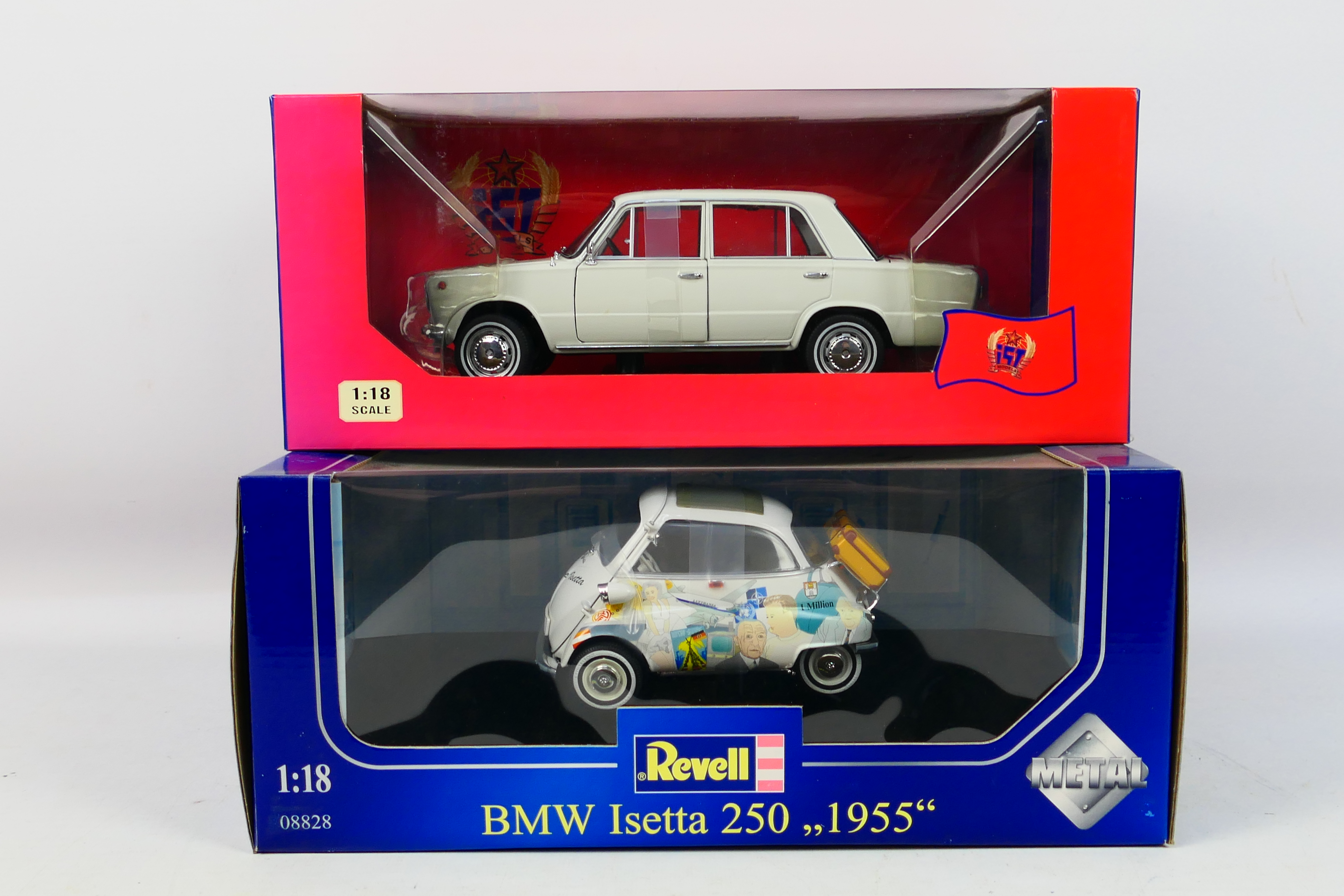 Revell - IST Models - Two boxed 1:18 scale diecast model vehicles.