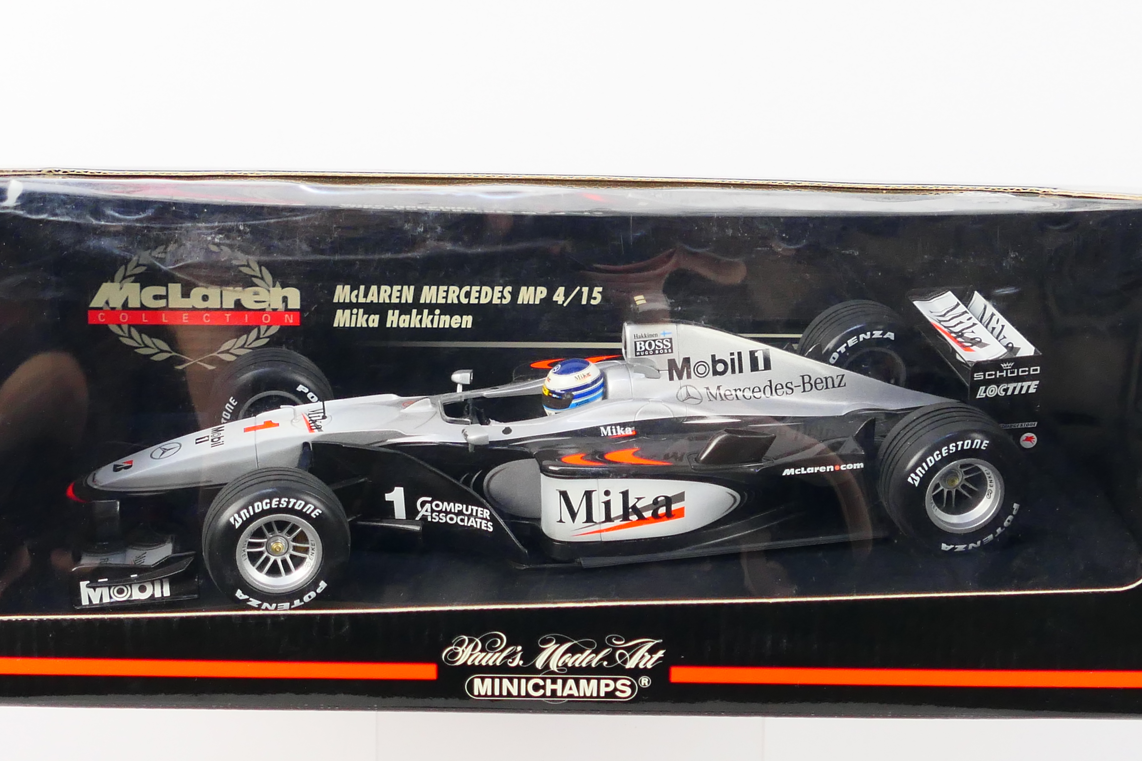 Minichamps- A boxed 1:18 scale McLaren Mercedes MP4/15 Mikka Hakkinen car which appears Mint in a - Image 2 of 3