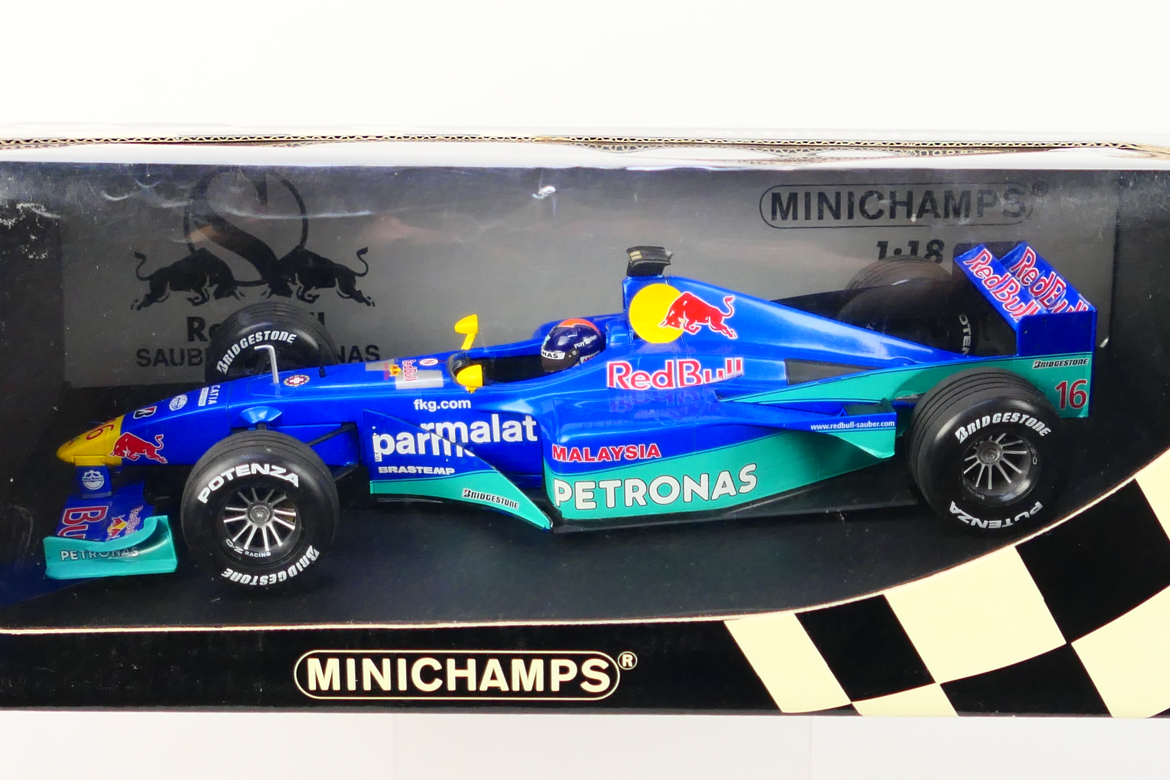 Minichamps- A boxed 1:18 scale Red Bull Sauber Petronas C19 Pedro Diniz car which appears Mint in a - Image 2 of 3